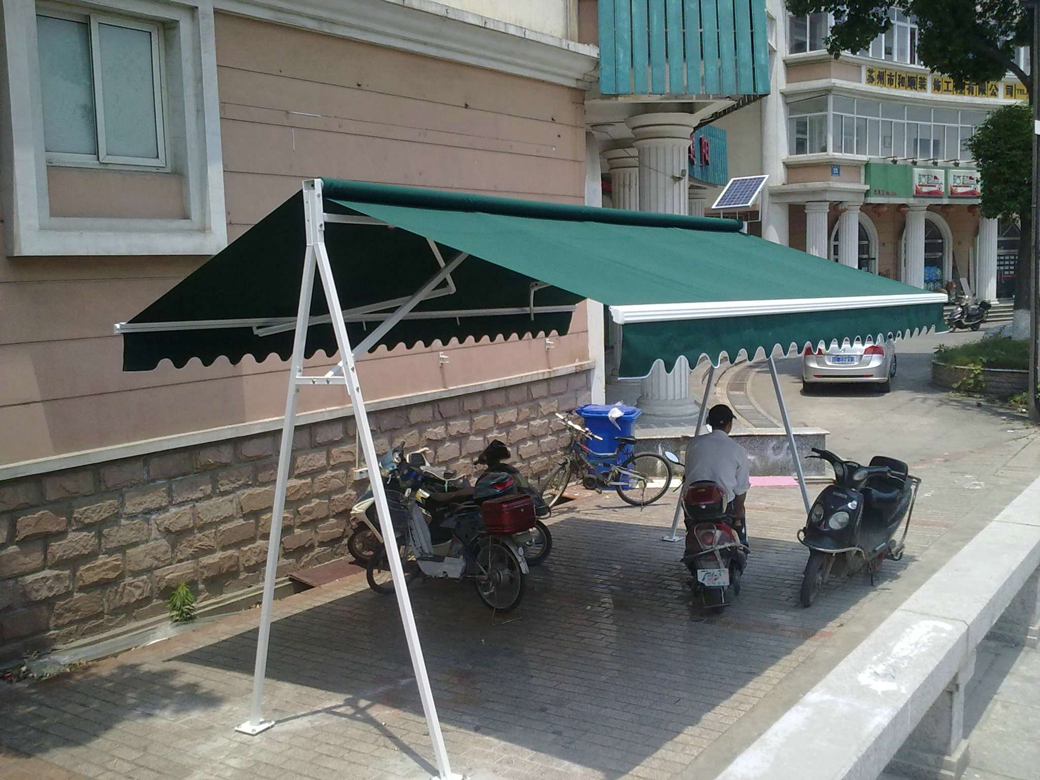 雙開式電動伸縮雨篷